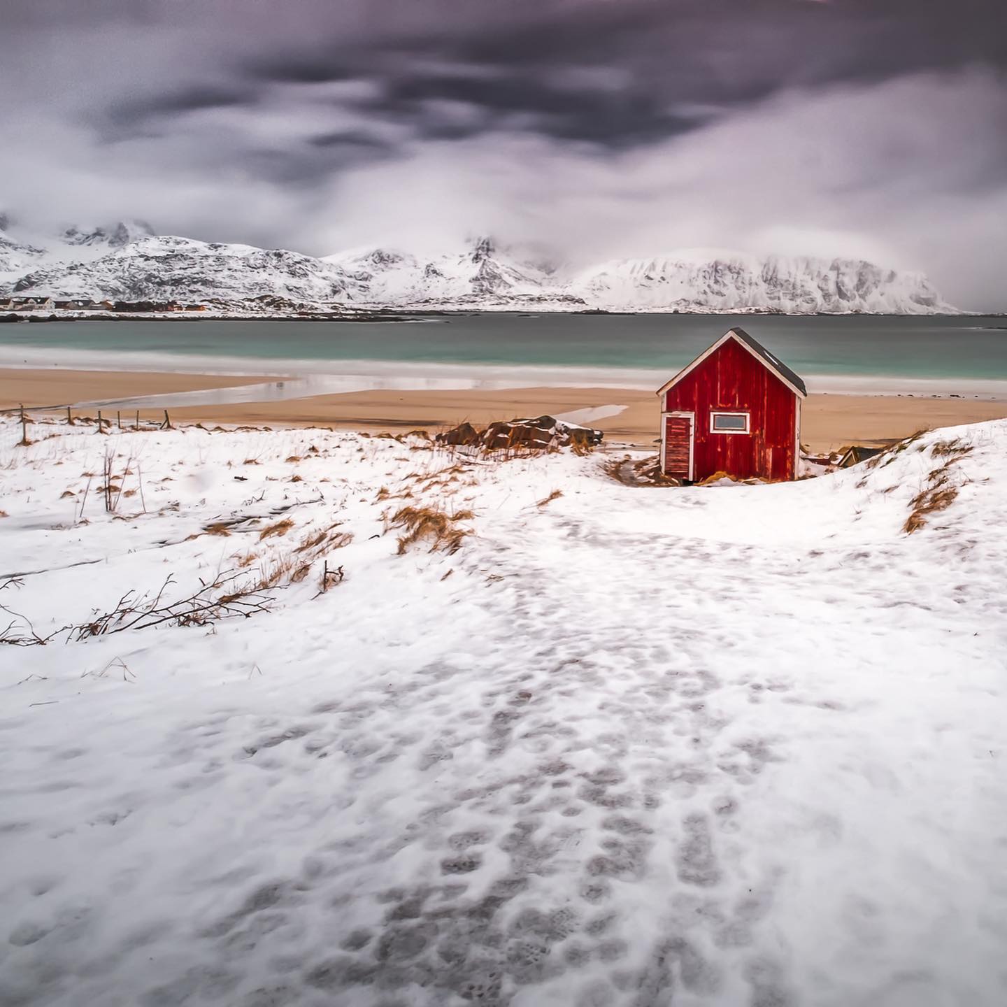 Red cabin with snow